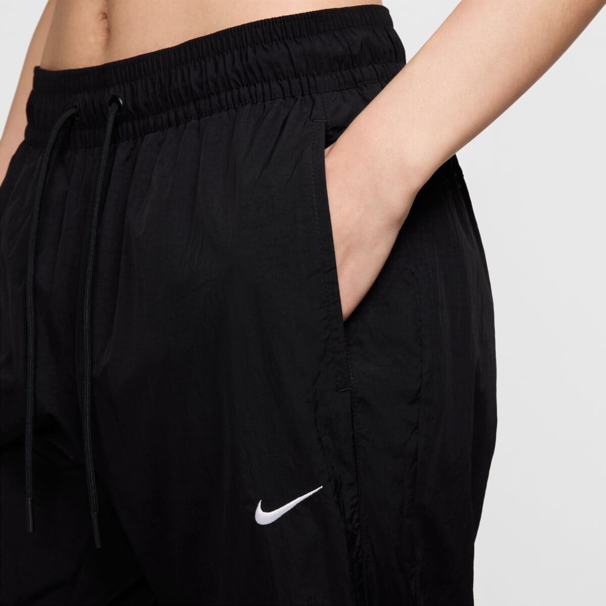 NIKE SPORTSWEAR COLLECTION WOMEN'S MID-RISE REPEL ZIP PANTS