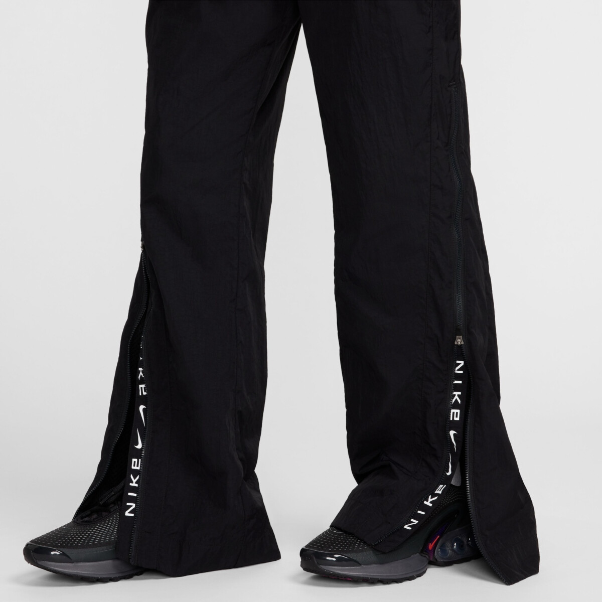 NIKE SPORTSWEAR COLLECTION WOMEN'S MID-RISE REPEL ZIP PANTS