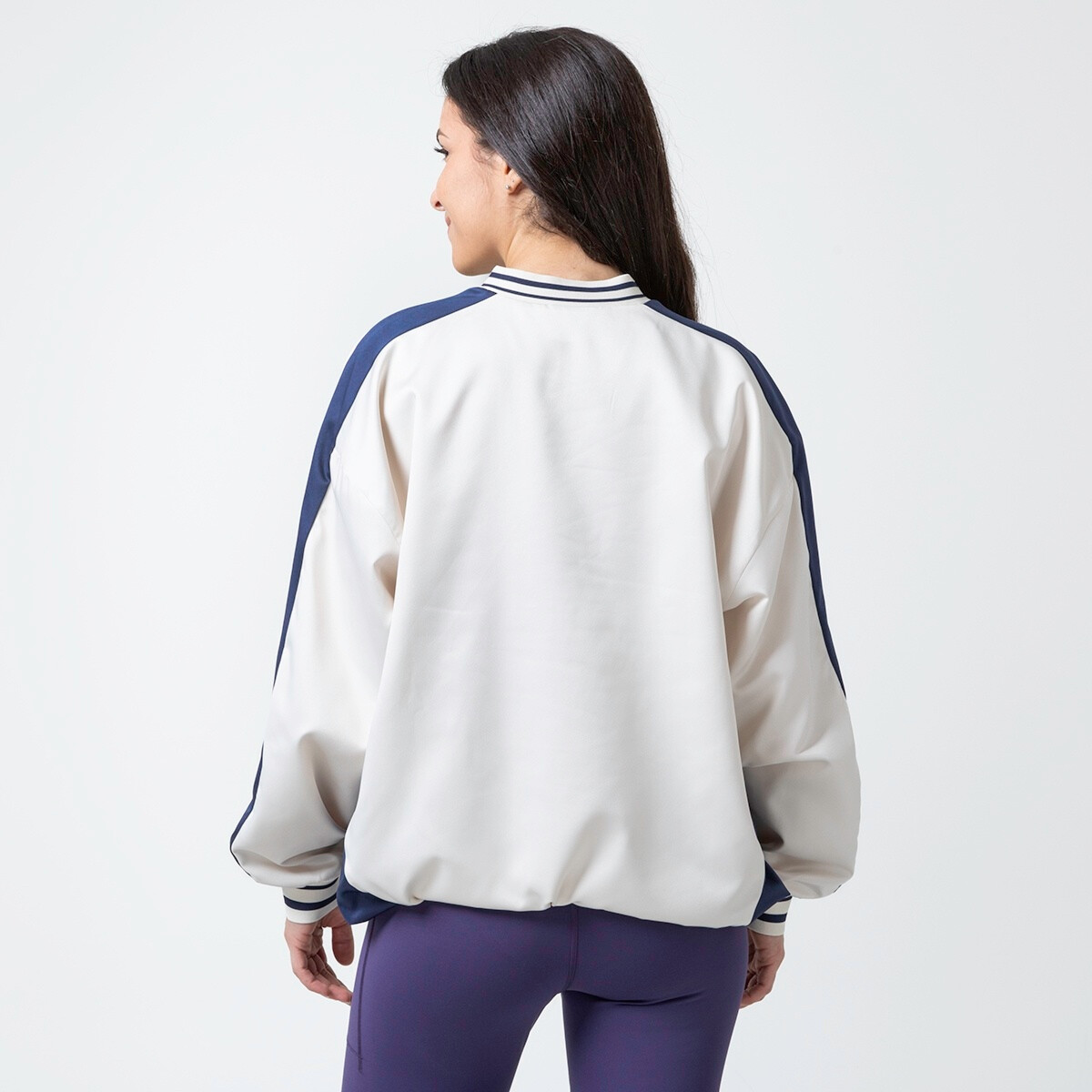 NEW BALANCE SATIN WOVEN PULLOVER | Hoodies and Sweatshirts | Sportland