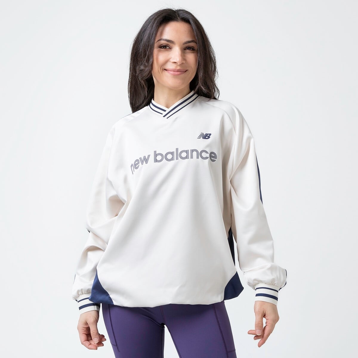 NEW BALANCE SATIN WOVEN PULLOVER | Hoodies and Sweatshirts | Sportland