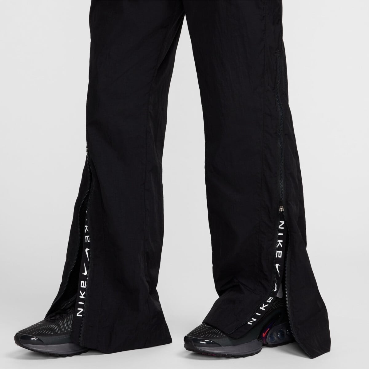 NIKE SPORTSWEAR COLLECTION WOMEN'S MID-RISE REPEL ZIP PANTS