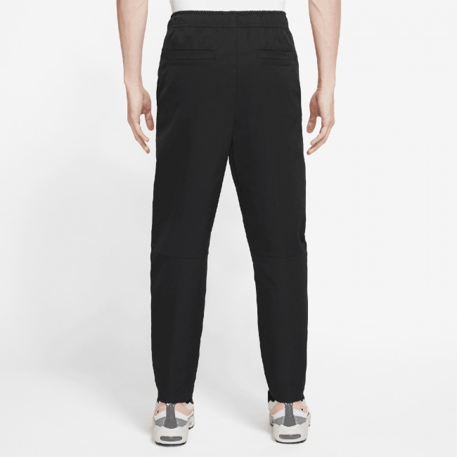 Nike woven tapered pants on sale